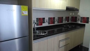 Fridge, microwave, stovetop, coffee/tea maker