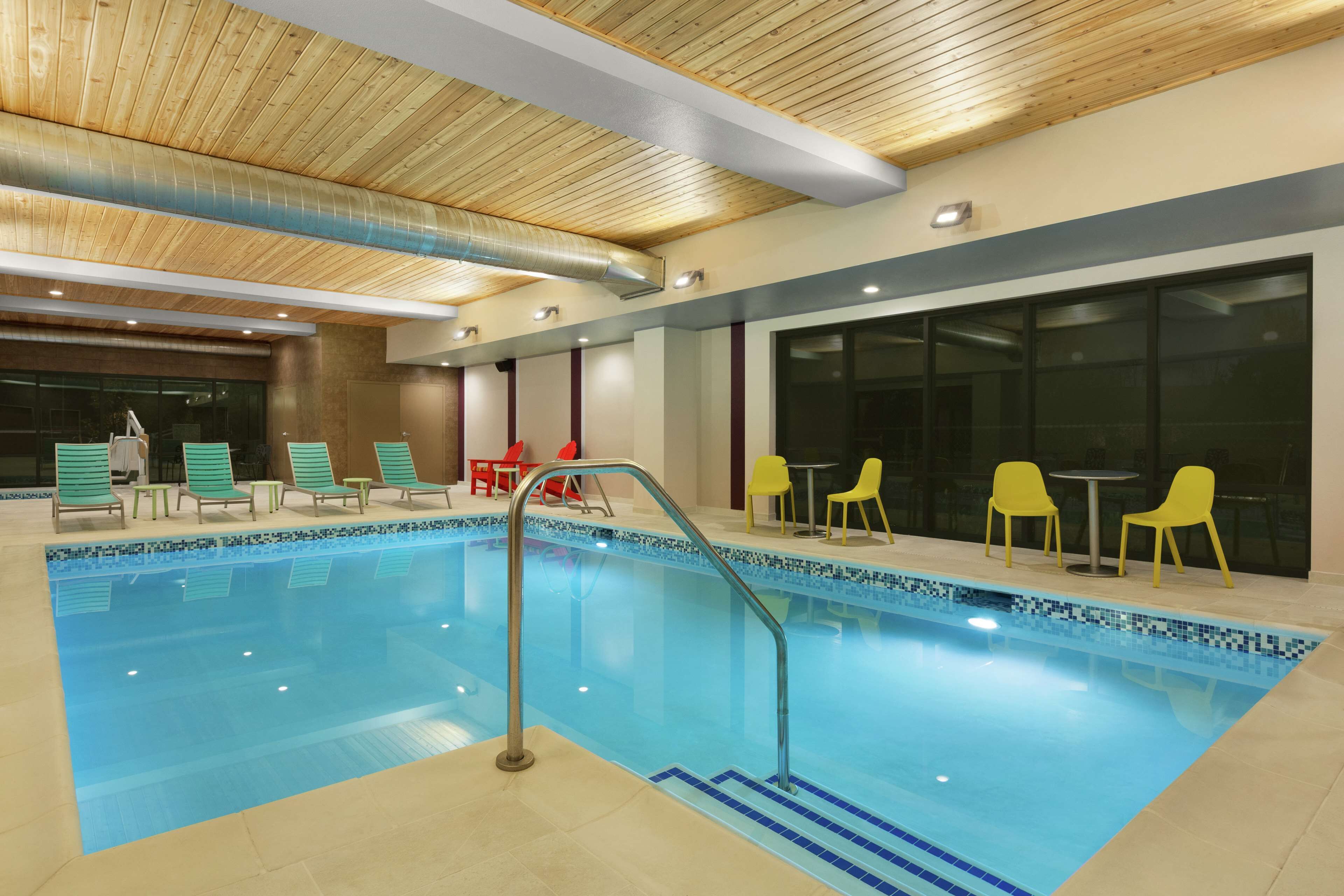 indoor pool, open 8:00 am to 10:00 pm, pool loungers
