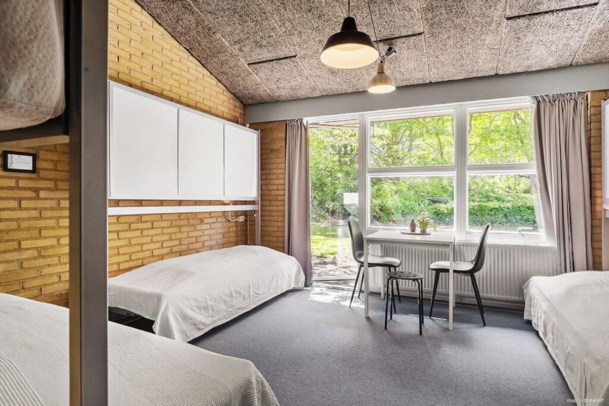 Familiekamer (6 people) | Een bureau, verduisterende gordijnen, gratis wifi, beddengoed