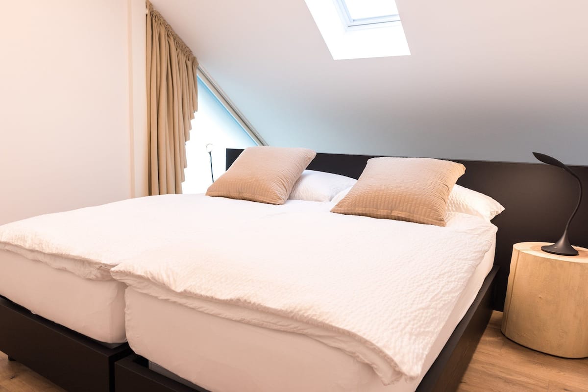 deluxe suite, 1 king bed with sofa bed, garden view | premium bedding, individually decorated, individually furnished, desk