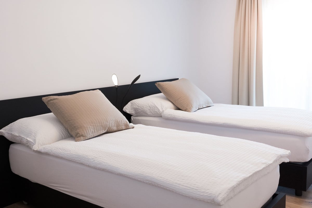 family suite, multiple beds, garden view | premium bedding, individually decorated, individually furnished, desk