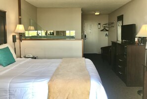 Standard Room, 1 Queen Bed | Desk, laptop workspace, blackout drapes, iron/ironing board