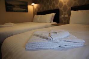 Habitació familiar | Planxa i posts de planxar, wifi gratuïta i roba de llit 