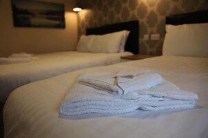 Family Room | Iron/ironing board, free WiFi, bed sheets