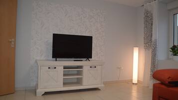 Standard Apartment | Living area | Flat-screen TV