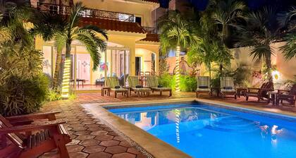 Spacious Hacienda style home with charming garden, screened porch and pool