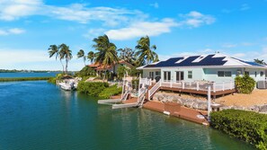 Exterior - Waterfront home with a large dock, pool, and deck area. Can accommodate pets. (Summerland)