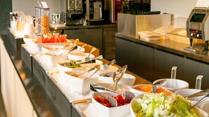 A buffet with various food items and utensils. - The Grand Palace (Tokushima)