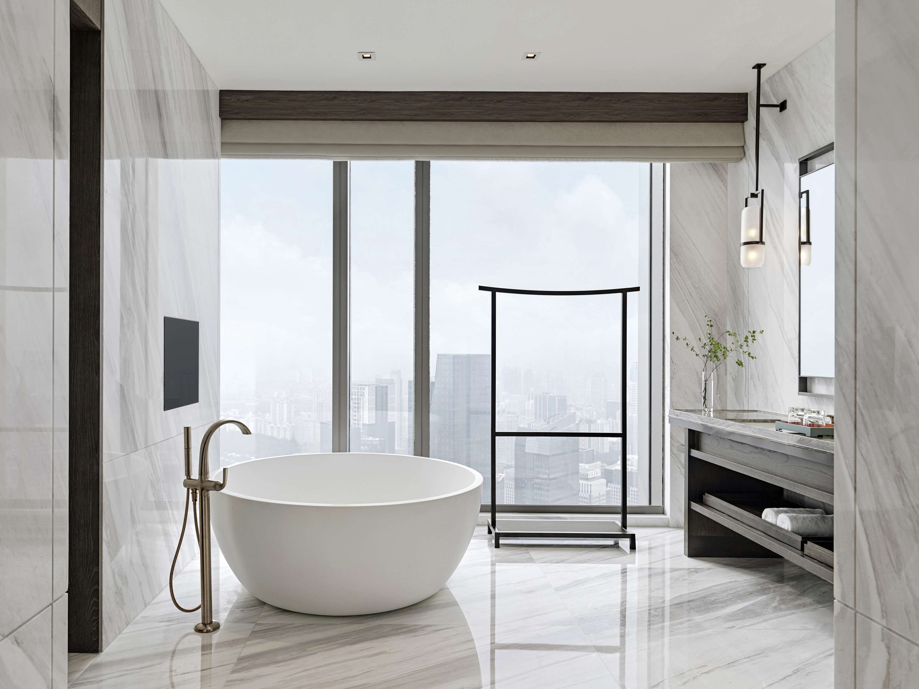 separate bathtub and shower, rainfall showerhead, designer toiletries