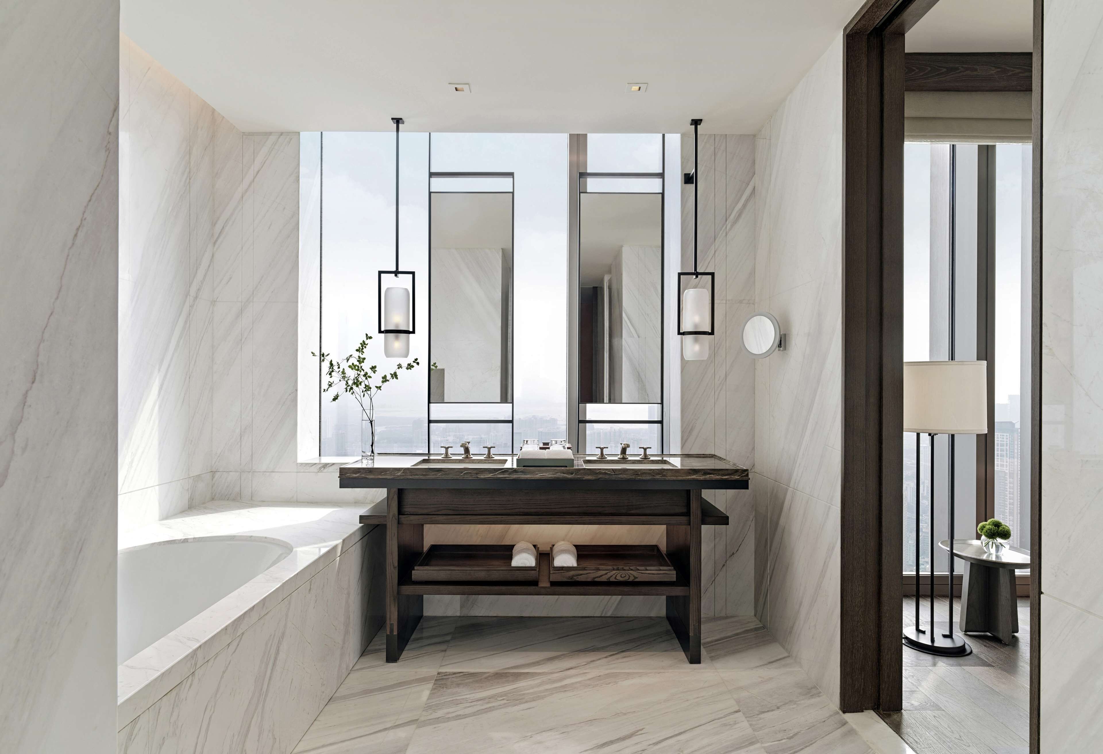 executive suite | bathroom | separate bathtub and shower, rainfall showerhead, designer toiletries