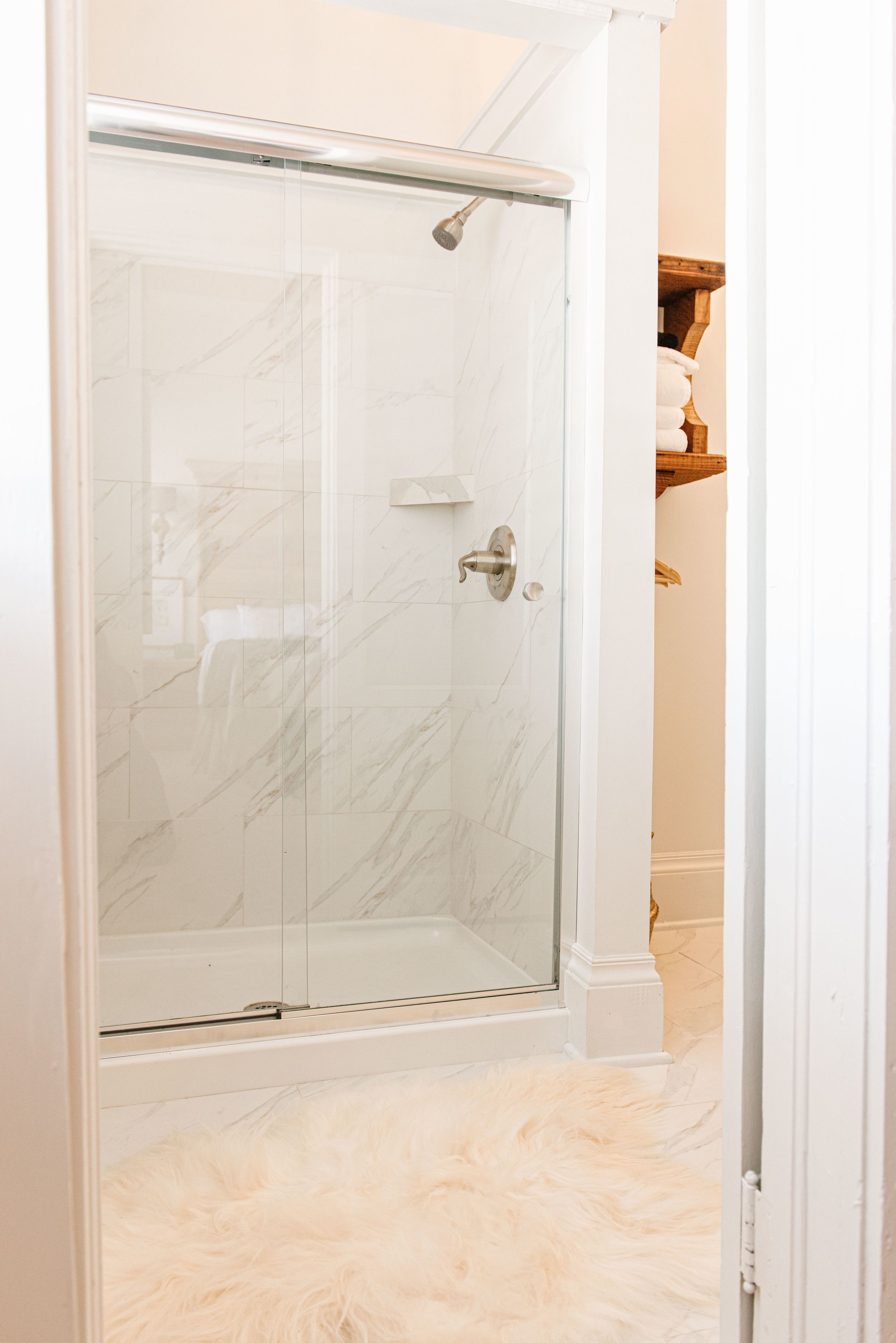 the louis winston suite | bathroom | combined shower/bathtub, designer toiletries, hair dryer, towels