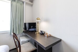 Twin Room, Smoking | Living area | 36-inch LED TV with cable channels, TV, books - Tabist Hotel Arflex Tokuyama Station (Shunan)