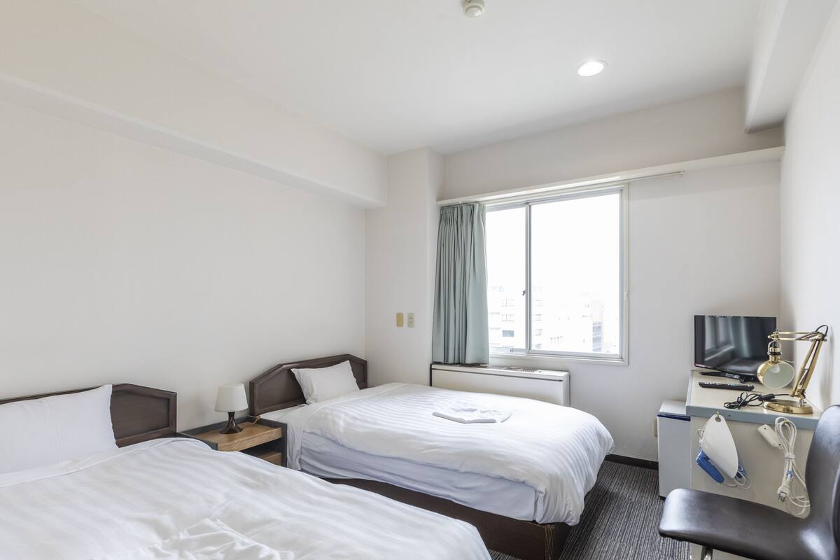 Desk, free WiFi, bed sheets