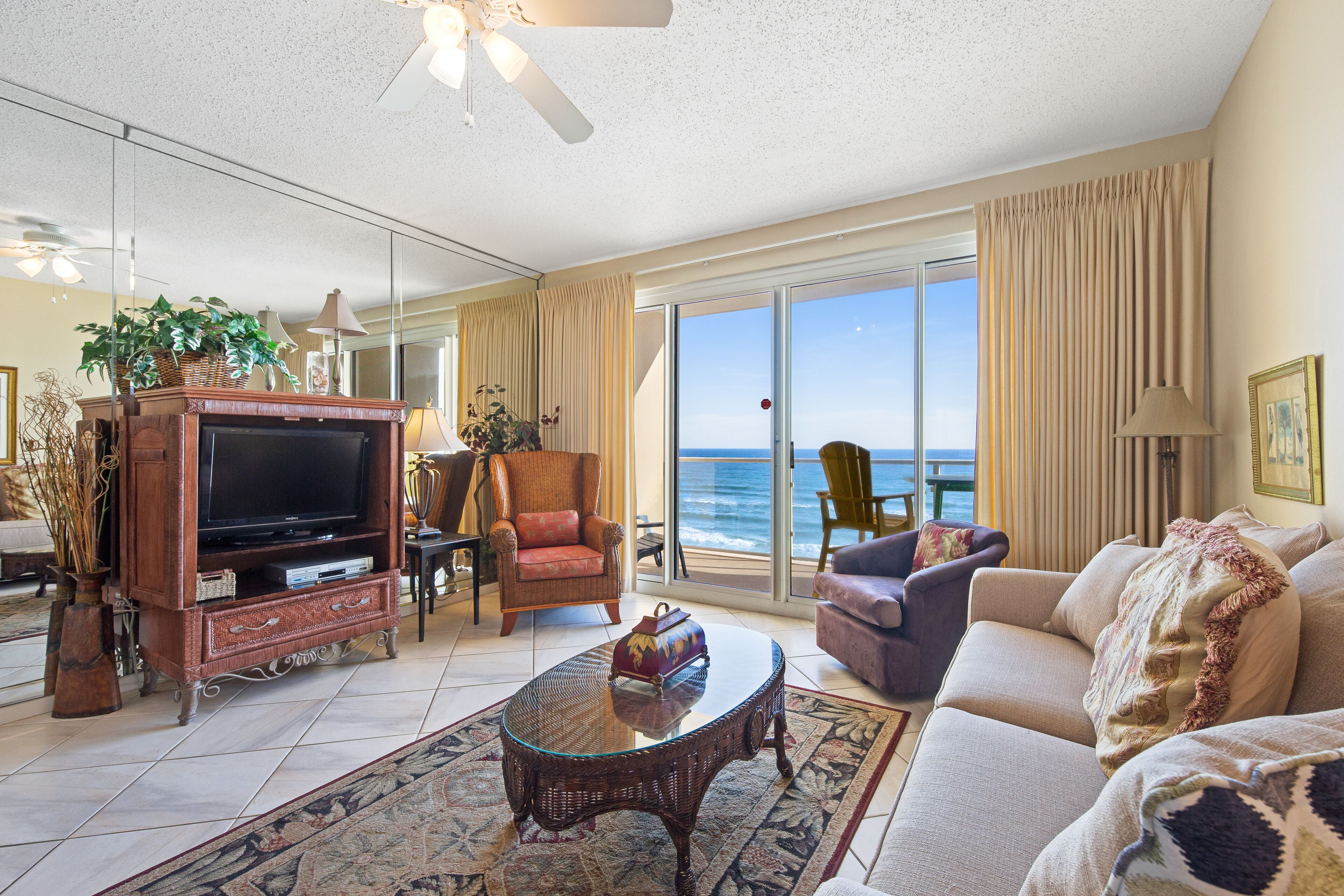 Serene beachfront home with furnished balcony, pool & fitness room access