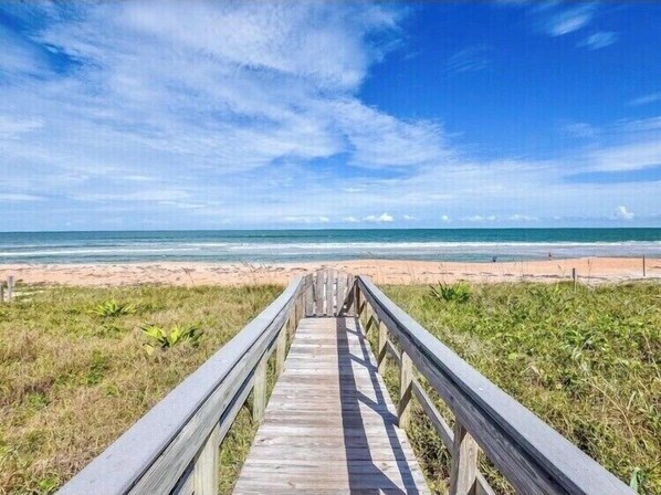 On the beach, sun-loungers, beach towels
