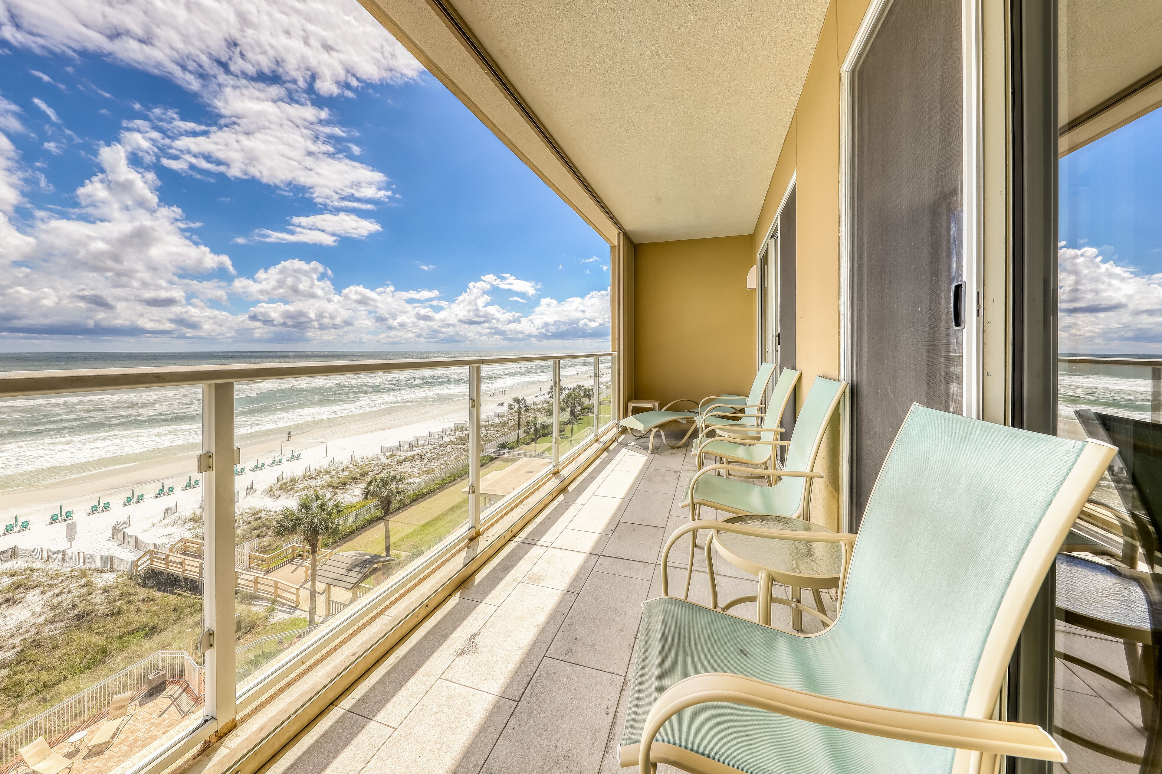 Sunny water view condo with balcony, pool & on-site amenities