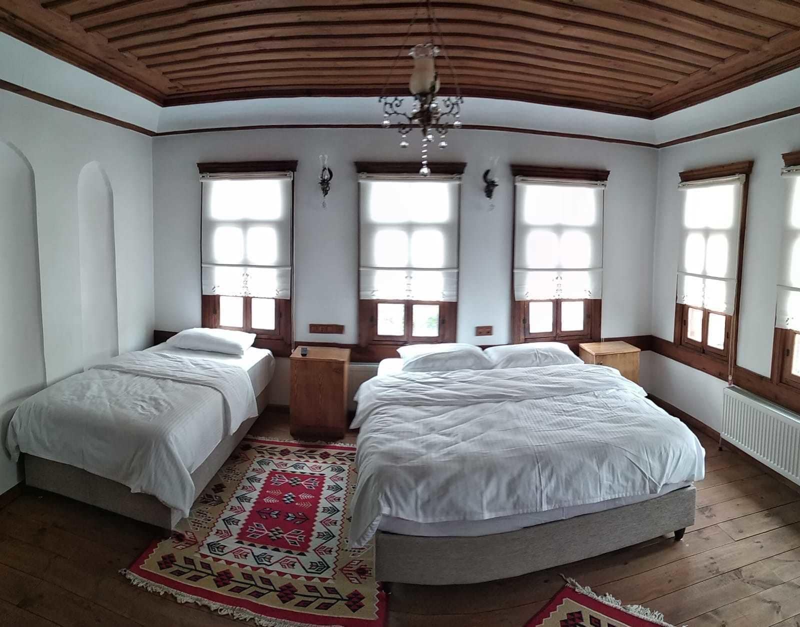 family room | minibar, in-room safe, iron/ironing board, free wifi