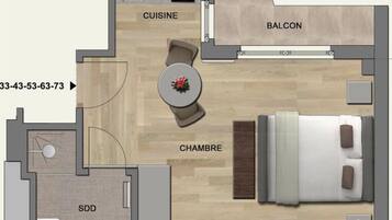 Grundriss eines Hotelzimmers mit Schlafzimmer, privatem Badezimmer, Küchenzeile, Balkon und einer kleinen Sitzecke.