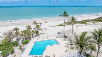 On the beach, sun-loungers, beach towels
