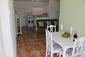 Standard Apartment, 2 Bedrooms, Ocean View | Living area | TV
