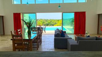 Deluxe Villa, Multiple Beds, Smoking, Ocean View | Living area | TV