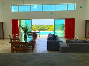 Deluxe Villa, Multiple Beds, Smoking, Ocean View | Living area | TV - Hacienda El Lusitano (Cabarete)