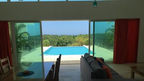 Villa – deluxe, flere senger, røyk, havutsikt | Oppholdsområde
