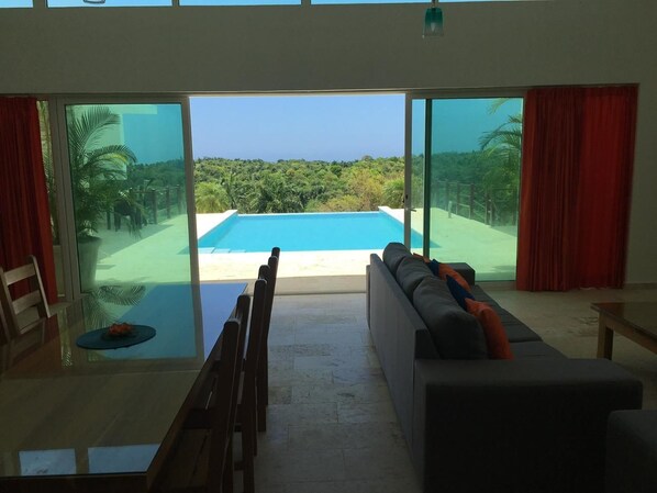 Deluxe Villa, Multiple Beds, Smoking, Ocean View | Living area | TV