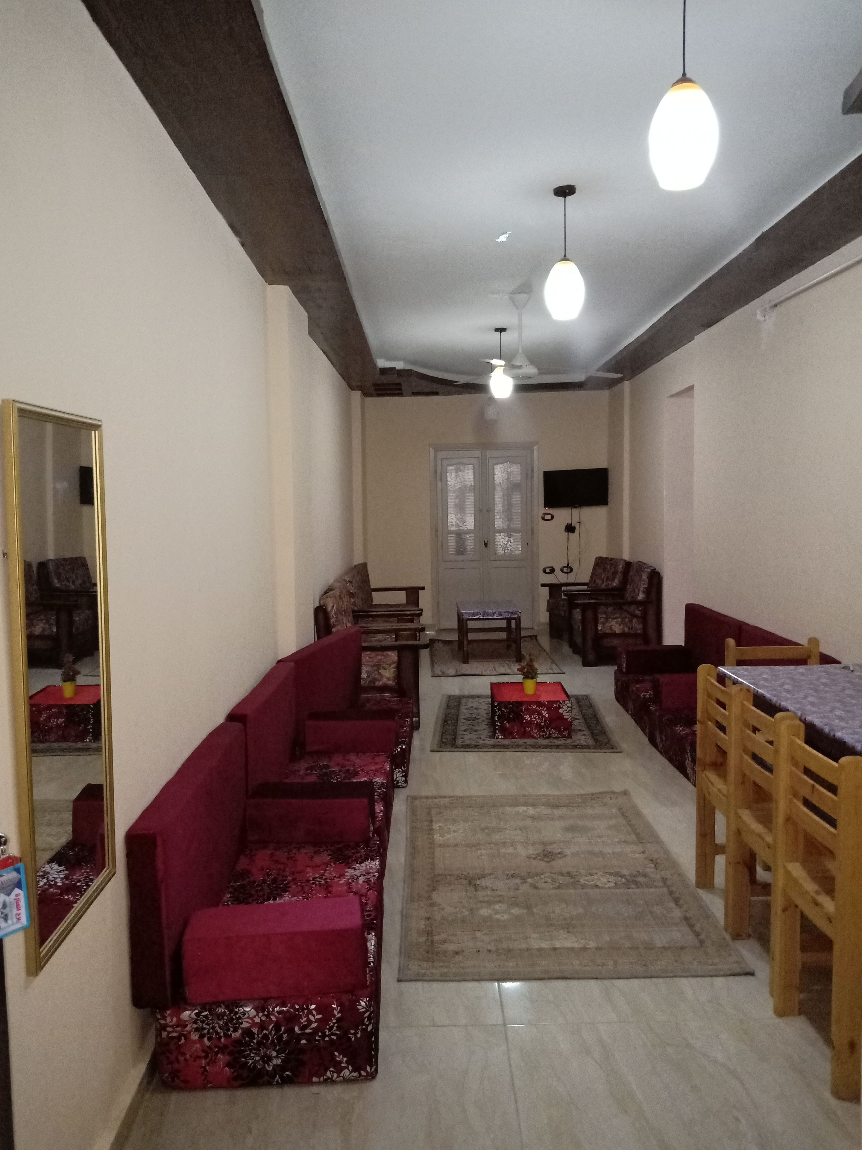 Deluxe Apartment, 3 Bedrooms, City View | Living area | 32-inch flat-screen TV with satellite channels, TV