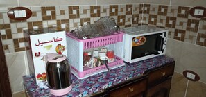 Lägenhet Deluxe - 3 sovrum - utsikt mot staden | Eget kök | Kylskåp, mikrovågsugn, ugn och spishäll