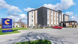 A Comfort Inn & Suites building with a parking lot and a red truck in front. - Comfort Inn & Suites (Goderich)