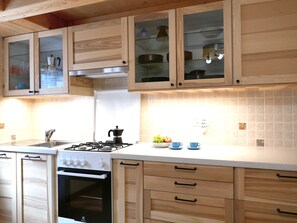 Fridge, oven, highchair, cookware/dishes/utensils