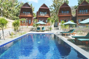 Outdoor pool, pool umbrellas, pool loungers