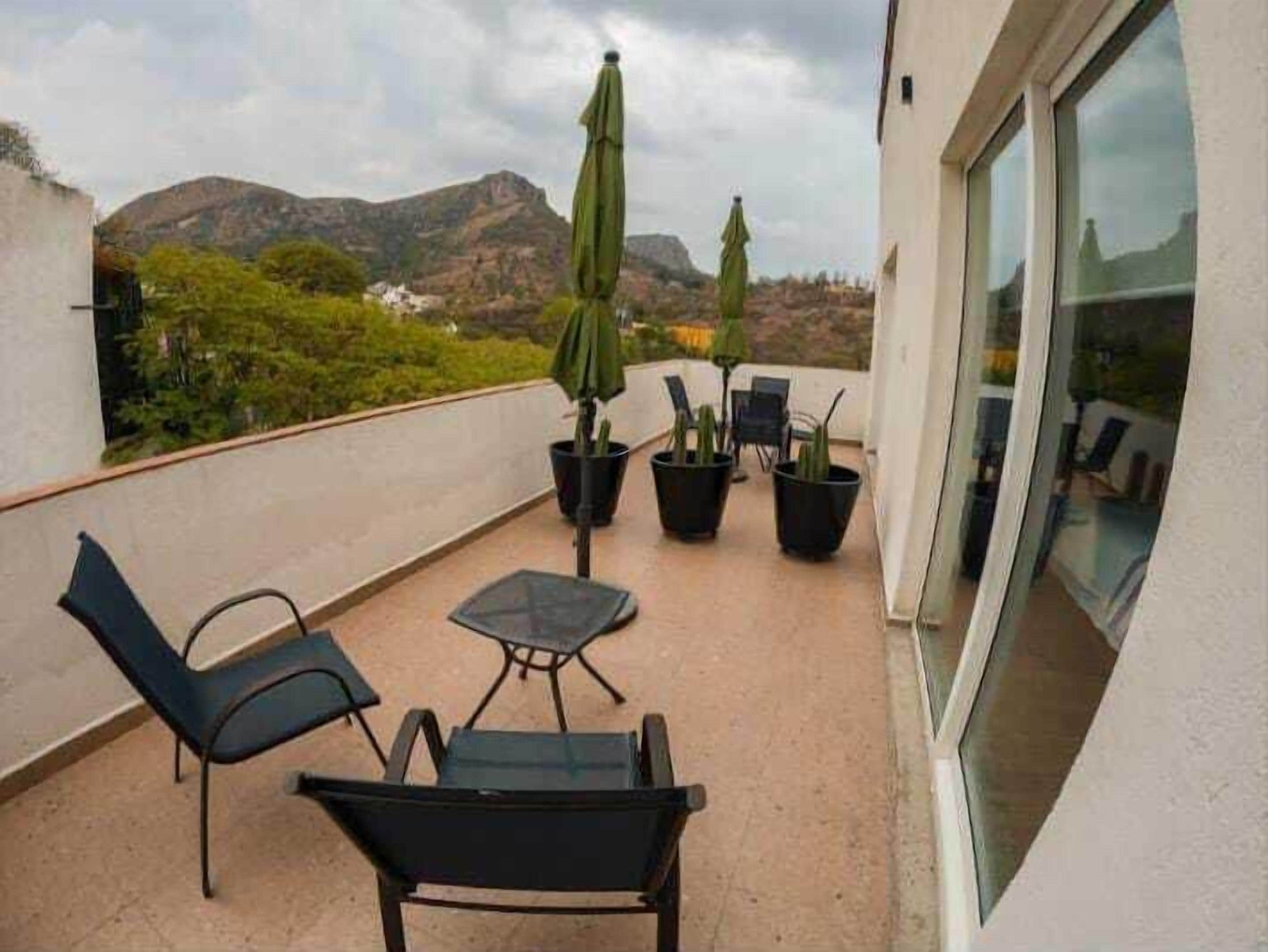 Habitación doble, 1 cama King size, Terraza, vista al jardín | Terraza o patio