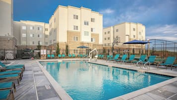 Outdoor pool, open 6:00 AM to 9:00 PM, pool umbrellas, pool loungers
