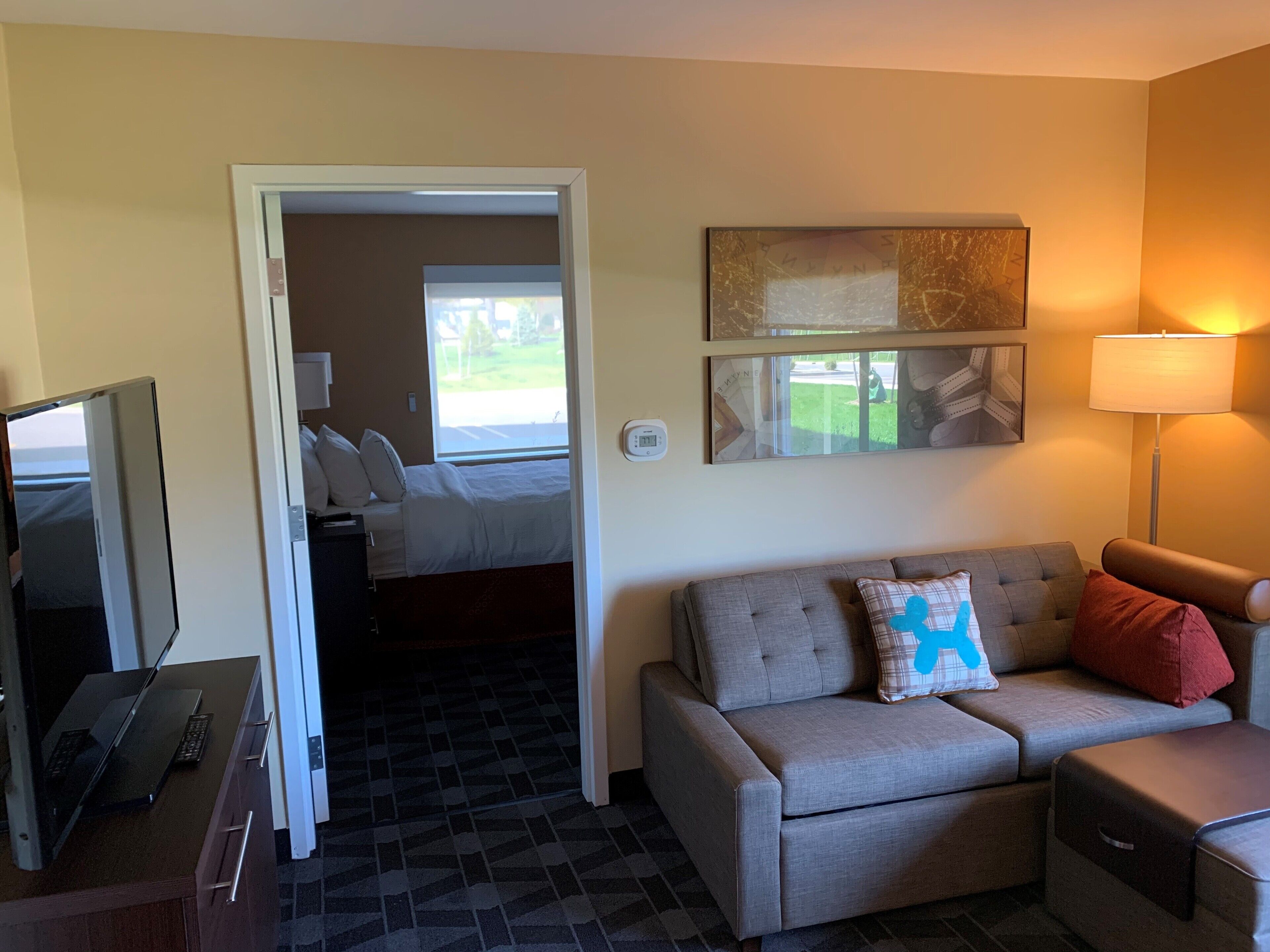 desk, laptop workspace, blackout curtains, iron/ironing board