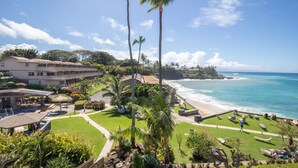 A resort with a pool, beach access, and a view of the ocean. - Ocean View Kahana 2BR w/secluded beach,pool, AC,2 Lanai's-Maui Condo Rental (Lahaina)