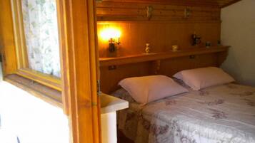 2 habitaciones, tabla de planchar con plancha, internet y ropa de cama