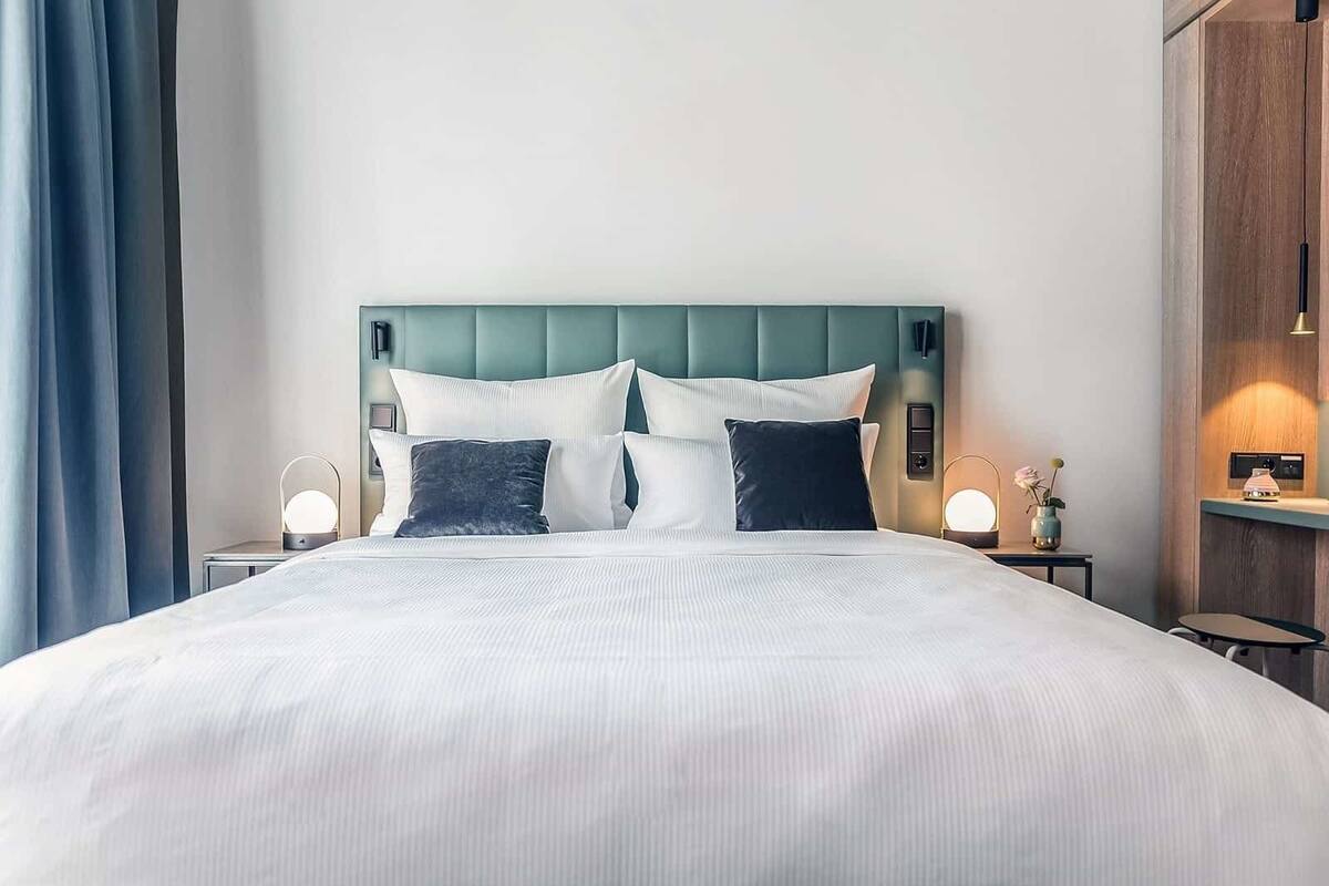 standard double room (homely green) | premium bedding, in-room safe, blackout curtains, soundproofing