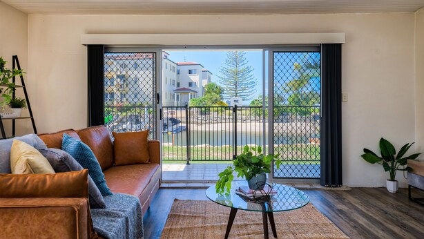Deluxe House, Lake View | Living area | Flat-screen TV - Private Coastal Escape Stunning Views (Runaway Bay)
