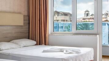 Standard Quadruple Room, 4 Bedrooms | WiFi (free), bed sheets
