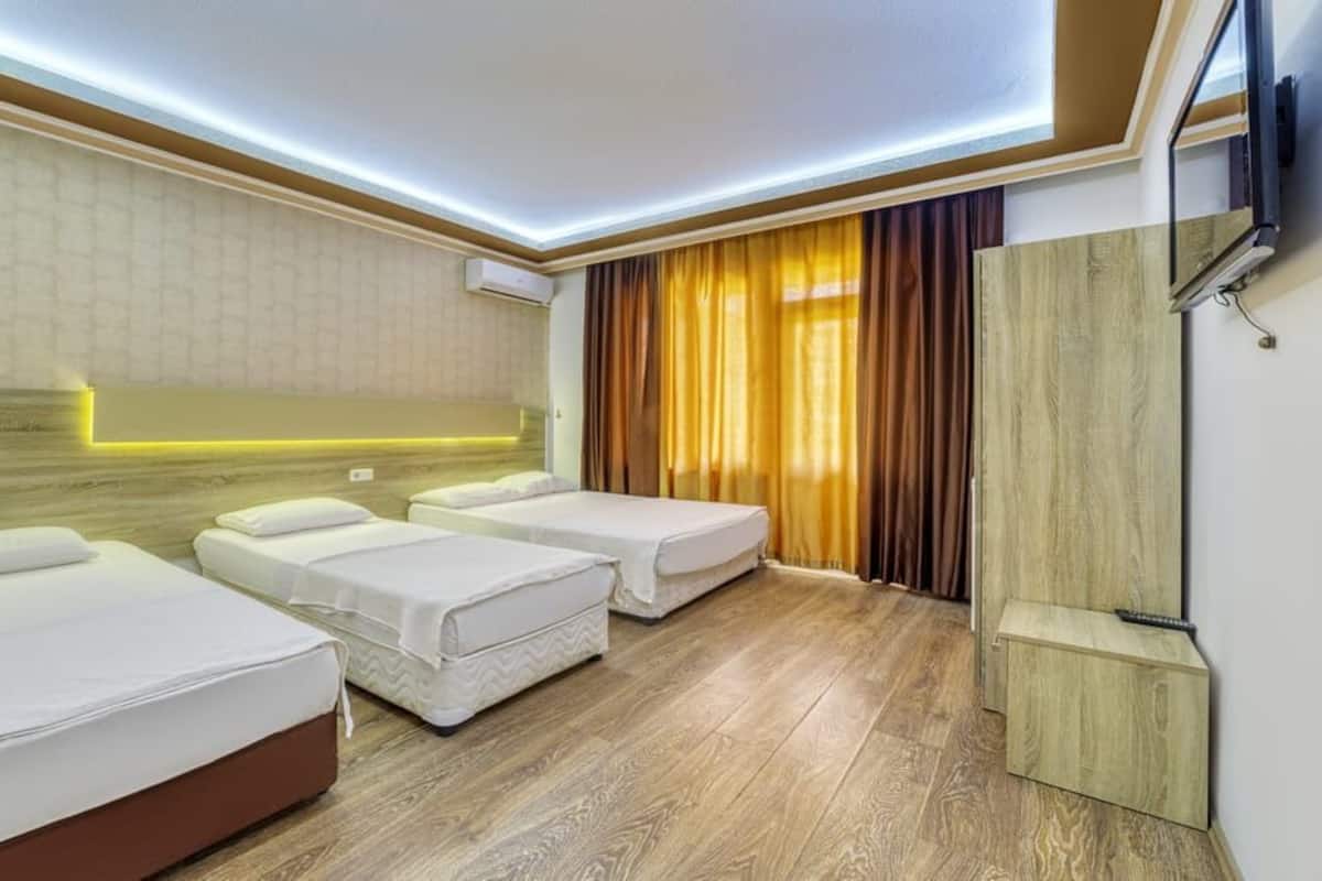 Quarto quádruplo standard, 4 quartos | Wi-Fi de cortesia, roupa de cama