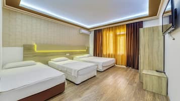 Chambre Quadruple Standard, 4 chambres | Wi-Fi gratuit, draps fournis