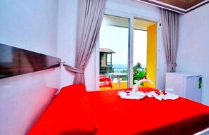 Standard Tek Büyük Yataklı Oda | Ücretsiz kablosuz İnternet, çarşaf takımı 