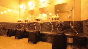 A public restroom with multiple sinks, mirrors, and hand dryers. - AB Hotel Tokai Otagawa (Tokai)