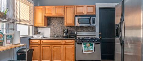Microwave, coffee/tea maker, cookware/dishes/utensils