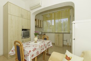 Departamento Prestigio | Área de sala de estar | Televisión de pantalla plana 