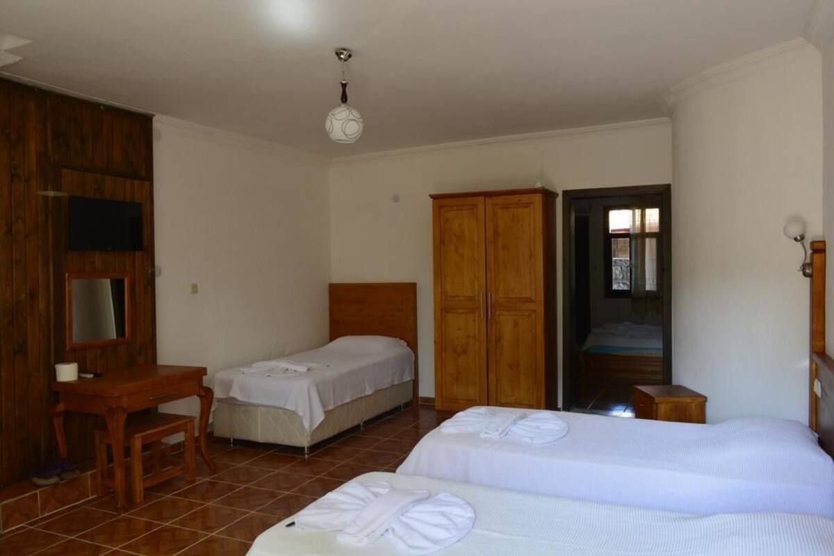 Habitación familiar | Sistema de insonorización, wifi gratis, ropa de cama