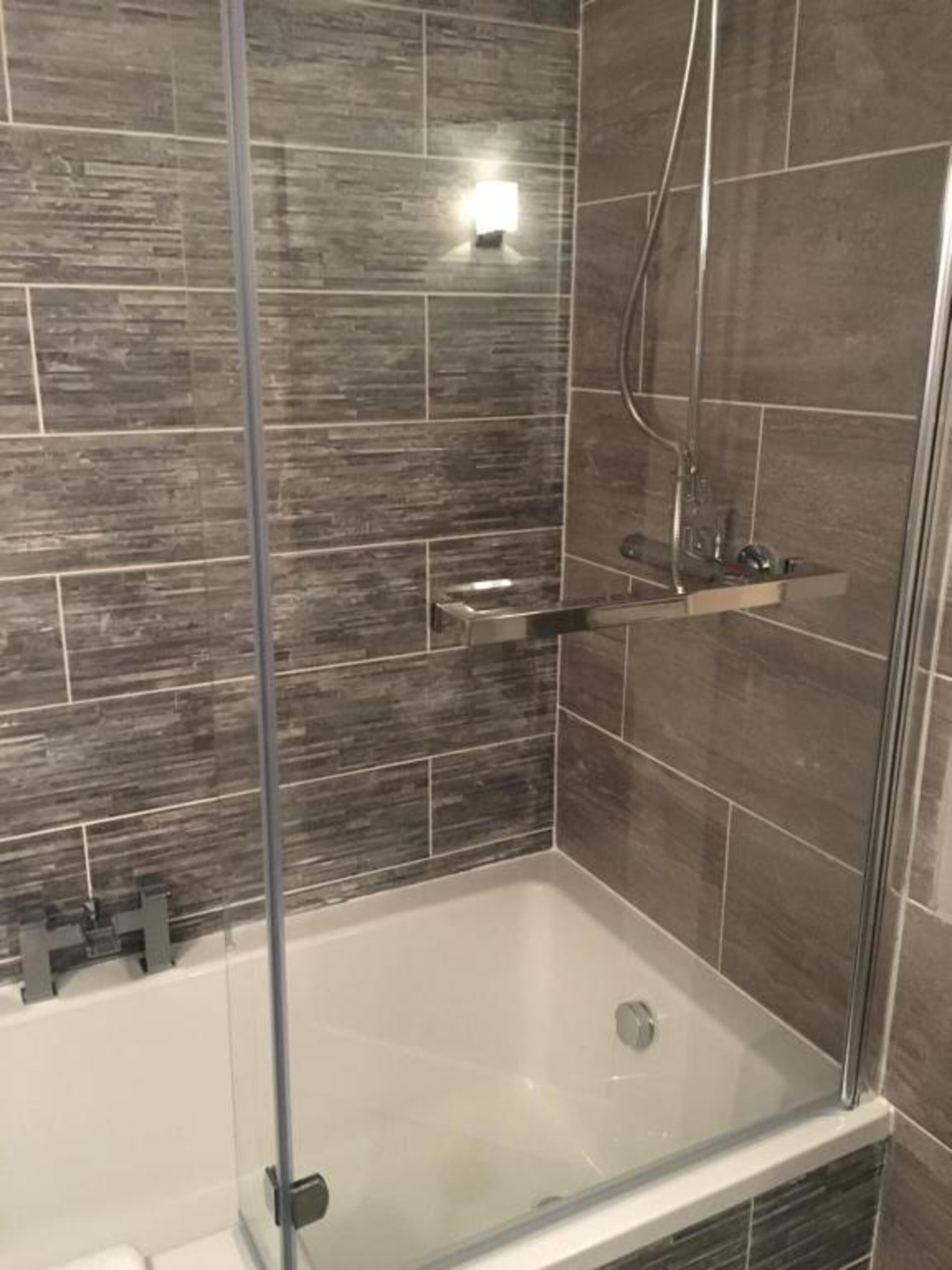 standard room, 1 king bed | bathroom | shower, designer toiletries, hair dryer, dressing gowns