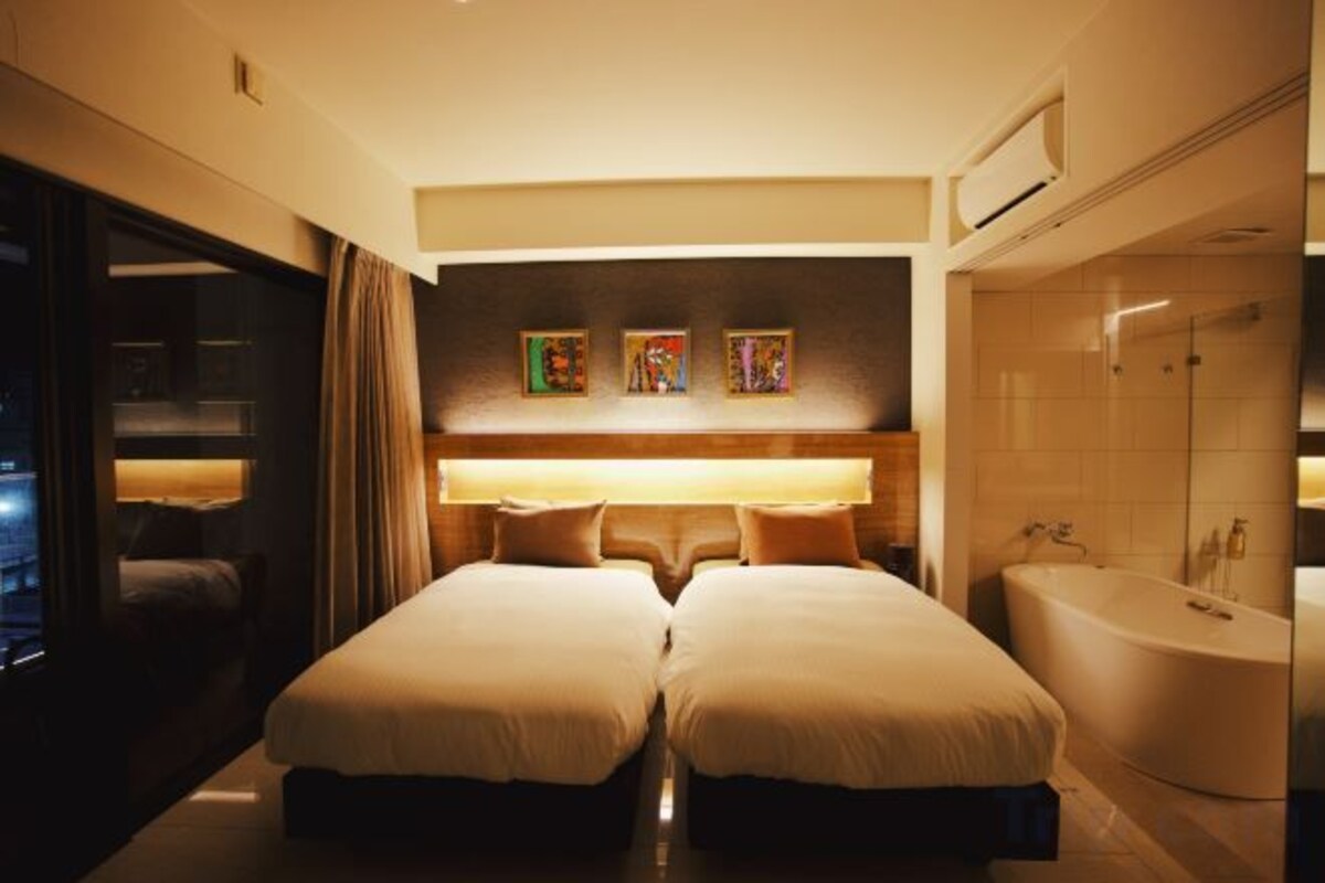 Premium bedding, down duvets, pillow-top beds, in-room safe